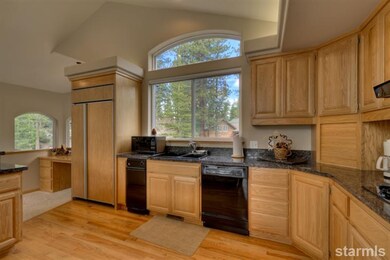 Built in refrigerator to match cabinetry.