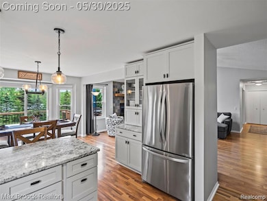 Kitchen opens to eat in area.