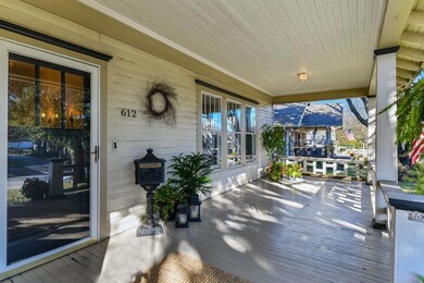 Large front porch for outdoor sitting area.