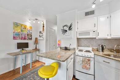 granite countertops.  Stove and microwave