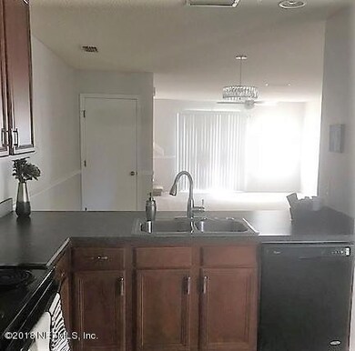 7704 Highchair Ln, Jacksonville, FL 32210 - photo 6