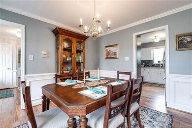 Alternate view of the dining room with a sneak pee