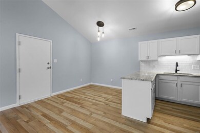 Vaulted ceilings make this home feel spacious and inviting