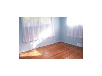 Bedroom 1.  Hardwood floors