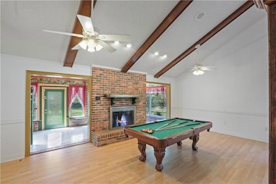 Pool table stays for the new owner! Gas fireplace.
