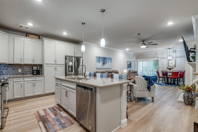 Kitchen featuring light hardwood / wood-style floo