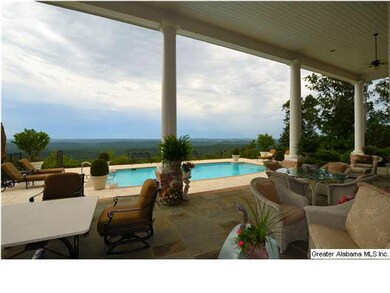 View of pool and Hoover / Birmingham from lanai.
