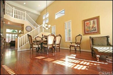 Large living & dining room with soaring cathedral 