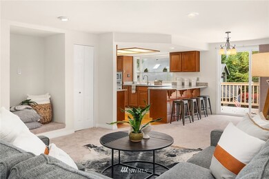 The family room is cozy and functional.  Entertaining is easy here as the kitchen connects to the living room and formal dining. 