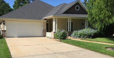 In spring time enjoy the Black Willow tree in its full regalia along with gorgeous plumbago that adorns the front entry.  Stacked stone accent gives the entry an added sense of how these homeowners have loved and cared for this home.