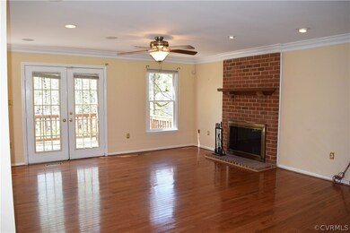 French door access off the family room to deck overlooking rear, fenced yard.