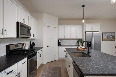 Huge kitchen with lots of storage and a walk-in pa