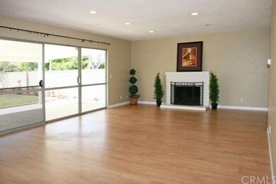 Huge Living Room with Wood Laminate Flooring