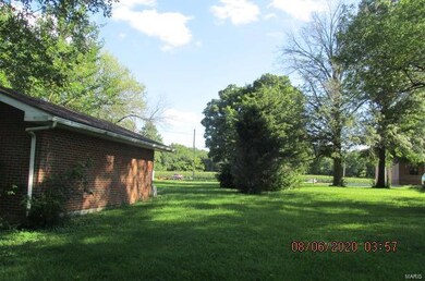 Rear view lots & garage