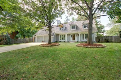 Large trees shade the home.