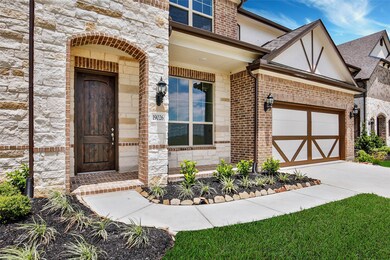 19026 Blossoming Buttercup Dr, Tomball, TX 77377 - photo 4
