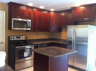 Kitchen with granite counters.