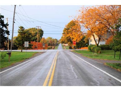 Exterior Front. View of Route 104 crossing Dickers