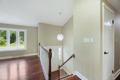 Foyer leads up to the living room or down to the f
