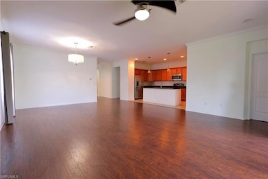Unfurnished living room featuring ornamental molding, ceiling fan, light wood finished floors, and recessed lighting