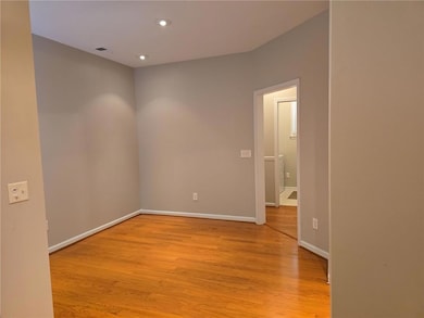 Dining room featuring light wood finished floors, visible vents, baseboards, and recessed lighting