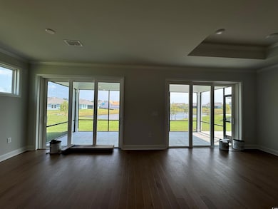 Spare room featuring plenty of natural light and d