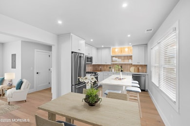 Dining to Living and Kitchen STAGED