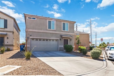 Traditional home featuring an attached garage, stu