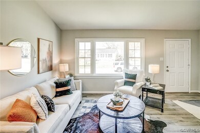 Living room featuring light hardwood / wood-style