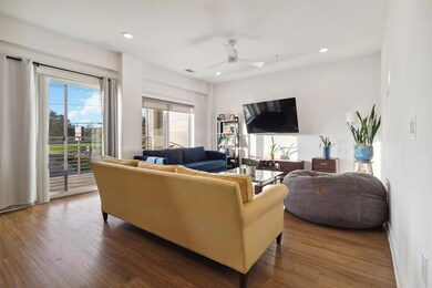 Living area featuring dark wood finished floors, 