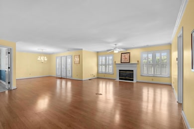 Wood style flooring , plantation shutters and Fireplace