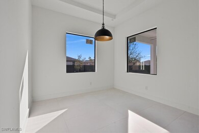 Empty room featuring tile patterned flooring and a
