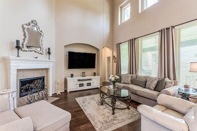 So grand and warm, this living area offers space and the feeling of home from the moment you walk in.