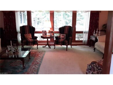 ENTRANCE VIEW FROM FOYER TO LARGE LIVING ROOM WITH PELLA WINDOWS