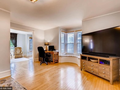 Note the charming window seat and open layout.