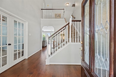 Grand and spectacular, the two-story foyer makes a