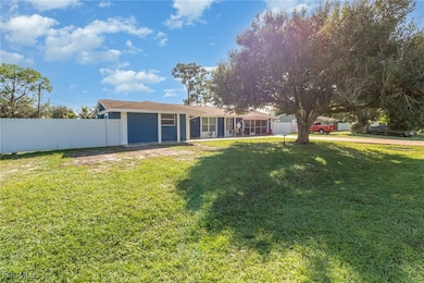 18 Illinois Rd, Lehigh Acres, FL 33936 - photo 2