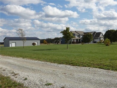 House and pole barn adjacent to the south