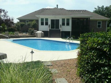 VIEW OF BACK OF HOME AND POOL AREA