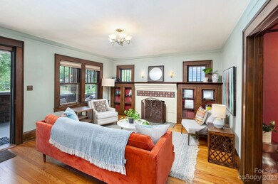 Cozy Living Room with Brick-Surround Fireplace