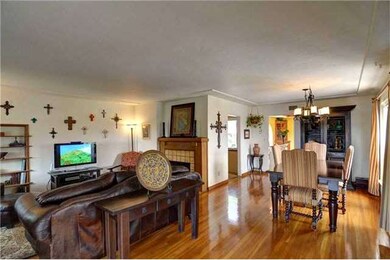 Dining room and family room with fire place.
