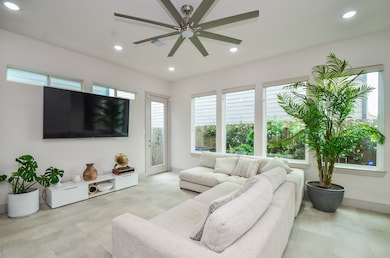 This spacious living area boasts an abundance of n
