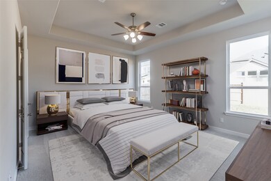 Come and unwind after a long day in this magnificent primary suite! This spacious room features plush carpet, warm paint, high ceilings, ceiling fan with lighting, and large windows.
