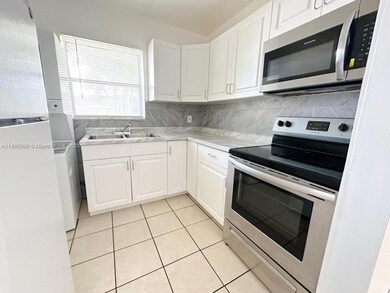 502 Phippen Waiters Rd unit 1-4, Dania, FL 33004 - photo 7