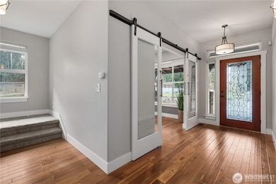 Entry with barn door to office