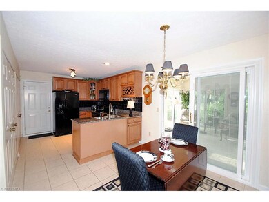 KITCHEN INCLUDES GRANITE, TILE FLOORING, CASUAL DI