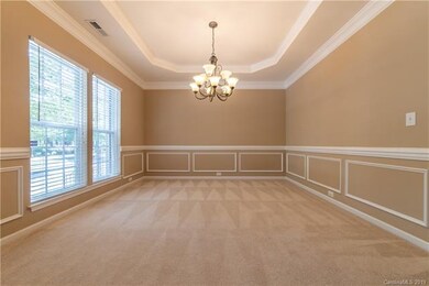 Living/Dining Room with Trey Ceiling and wainscoti