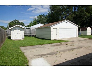 Parking Lot/Garage. Double garage and shed with ne