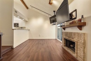 This living area is a large space with a comfortab