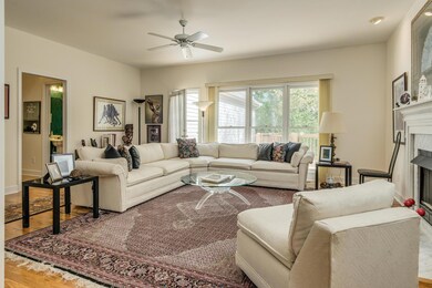 Huge Den with lots and light and door to the deck, Hardwood floors and cozy fireplace